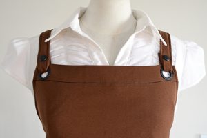 brown criss cross apron