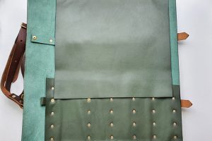 green leather carry case