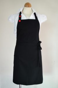 black apron with red